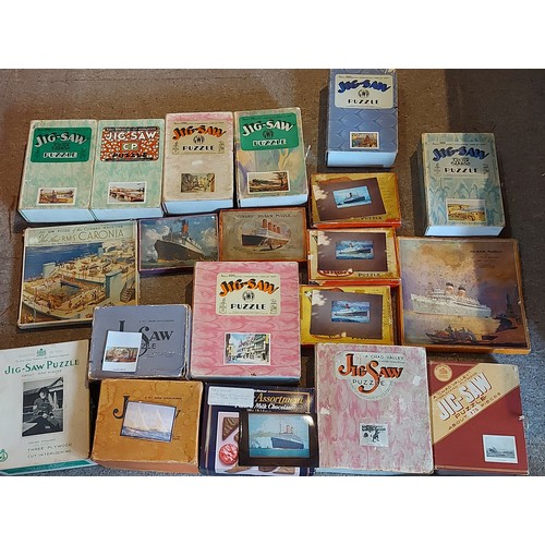 274 - A collection of puzzles by Chad Valley to include Chelsea Pensioner, Locomotives Old and New and oth... 