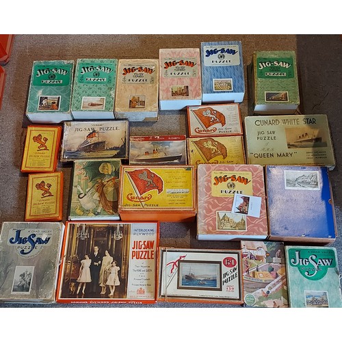 275 - A collection of puzzles by Chad Valley to include Cunard White Star Queen Mary, Windsor Castle From ... 