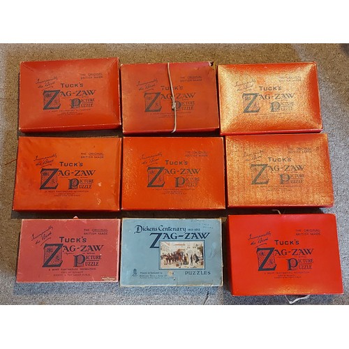 277 - A Raphael Tuck and Sons Zag-Zaw Jigsaw puzzle, Dickens Centenary together with seven other Zag-Zaw p... 