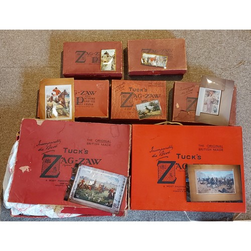 281 - A Raphael Tuck and Sons Zag-Zaw Jigsaw puzzle together with six other Zag-Zaw puzzles