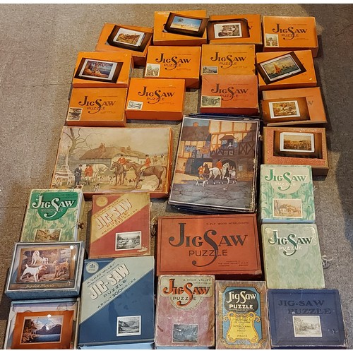 283 - A collection of Jigsaw puzzles by Chad Valley to include Cut Out Maps, Italy, The Garden Cottage and... 