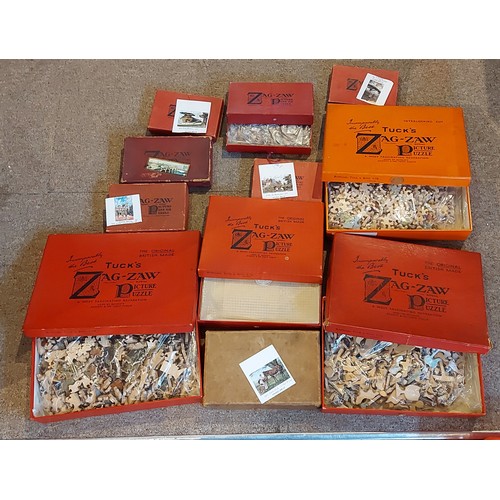 290 - A Raphael Tuck and Sons Zag-Zaw Jigsaw A Country Bouquet together with another A Rural Post Office a... 