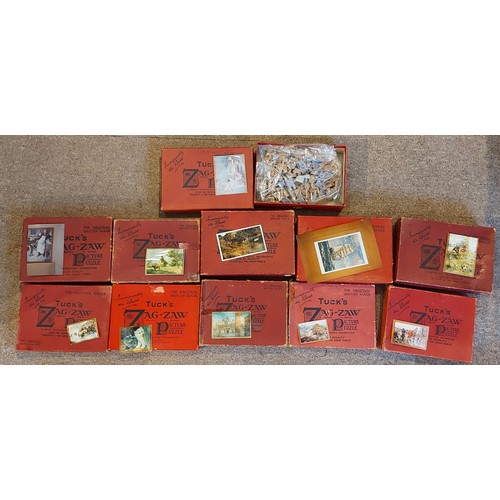292 - A Raphael Tuck and Sons Zag-Zaw Jigsaw puzzle Bound For The Golden East together with ten other Zag-... 