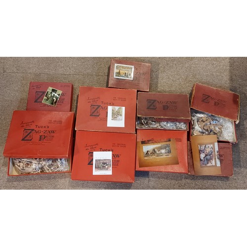 297 - A Raphael Tuck and Sons Zag-Zaw Jigsaw puzzle A Glass Of Port, An Irish Glen together with seven oth... 