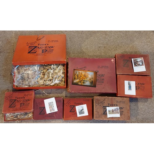 298 - A Raphael Tuck and Sons Zag-Zaw Jigsaw puzzle Golden Autumn together with seven other Zag-Zaw puzzle... 