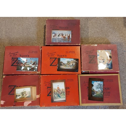 299 - A Raphael Tuck and Sons Zag-Zaw Jigsaw puzzle Gathering Waterlilies after Birket Foster together wit... 