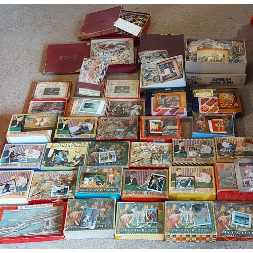 307 - Three Pastime Jigsaw puzzles by Parkers together with a collection of other Jigsaw puzzles by Zig Za... 