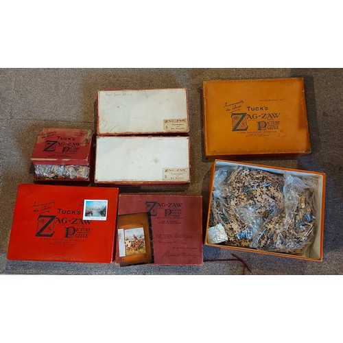309 - Raphael Tuck and Sons, Zag-Zaw Picture Play Puzzle for six players together with another similar and... 
