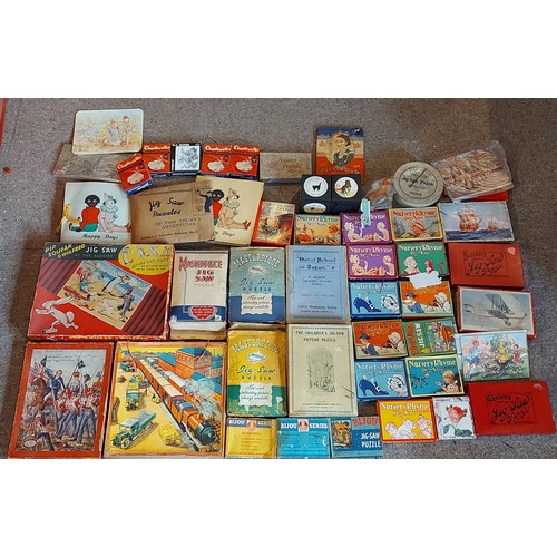 311 - A collection of Jigsaw puzzles to include masterpiece, Gamages puzzles and others