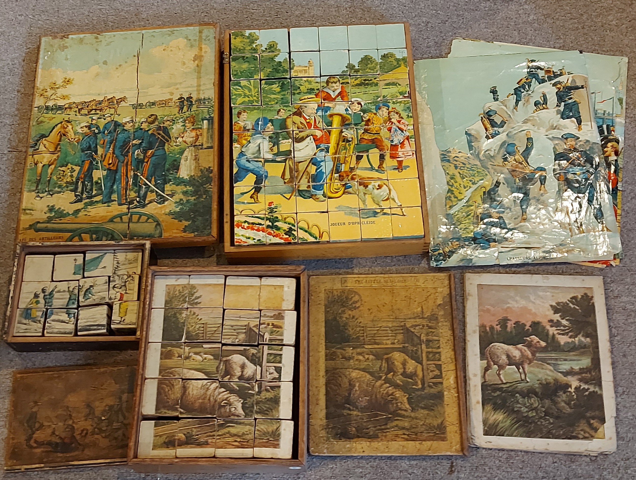 An early French block puzzle Cafe Des Artilleurs together with another ...
