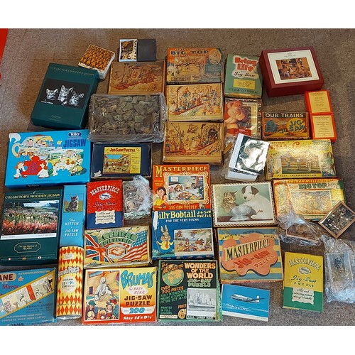 375 - A collection of Jigsaw Puzzles to include Masterpiece, William Ellis & Co