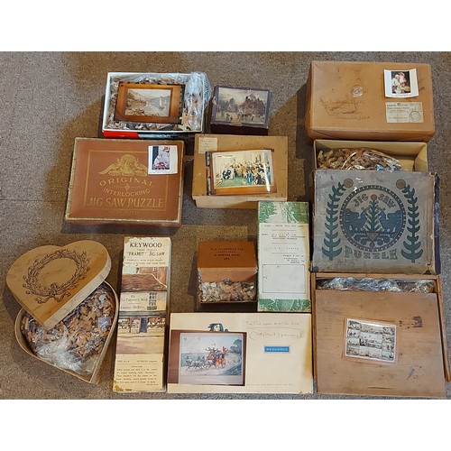 395 - A collection of early wooden Jigsaw puzzles in boxes to include The Dockyard With The Ship In All It... 