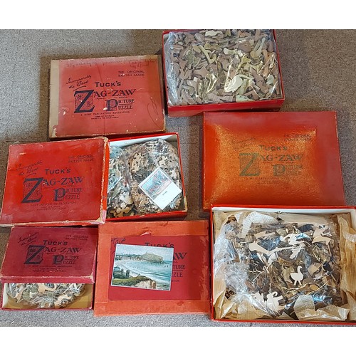 405 - A Raphael Tuck and Sons Zag Zaw Jigsaw puzzle A Gentle Wooing together with four other Zag Zaw puzzl... 