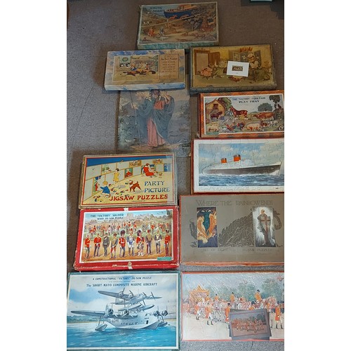 406 - A Victory Jigsaw puzzle The Short-Mayo Composite Marine Aircraft together with other puzzles to incl... 