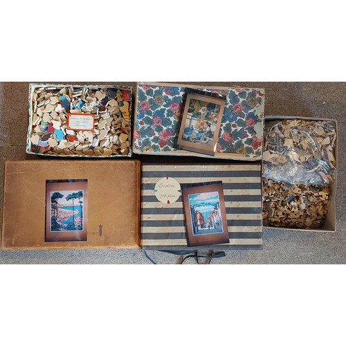 408 - A collection of five early wooden jigsaw puzzles