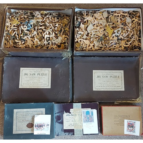 410 - A Jigsaw puzzle by Holtzapffels together with a collection of other puzzles to include The Graphic, ... 