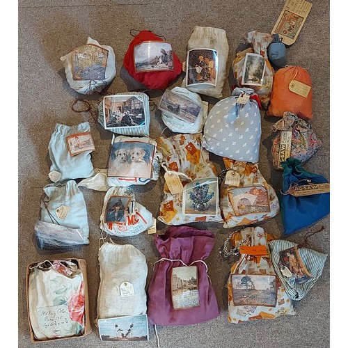 416 - A collection of early wooden Jigsaw puzzles, all in soft bags