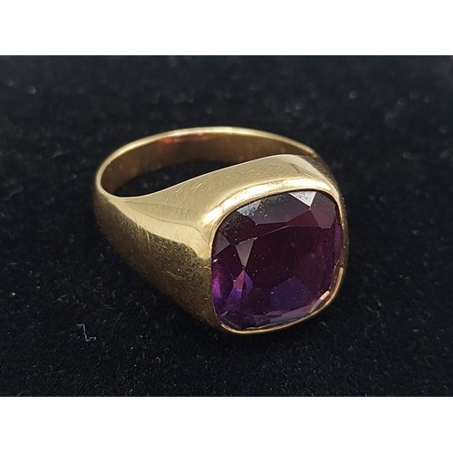 136 - A tested gold ring set with large rectangular Amethyst, ring size U, 10.5g