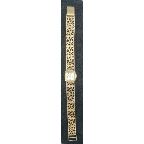 140 - A 9ct gold cased ladies wristwatch by Swiss Express with 9ct gold linked bracelet, 15.8g excluding m... 