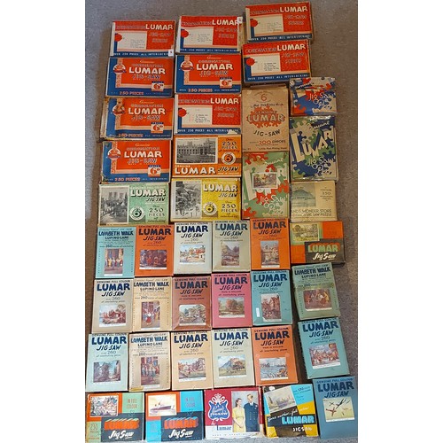 378 - A collection of Jigsaw puzzles by Lumar to include Little Red Riding Hood, Coronation and others by ... 