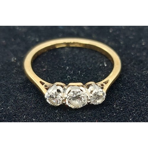 148 - An 18ct gold and Platinum three stone Diamond ring, 2gms, ring size L