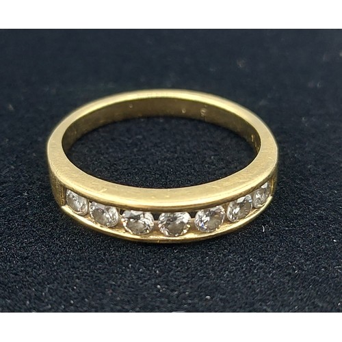 160 - An 18ct gold seven stone Diamond ring, 4.7gms, ring size R