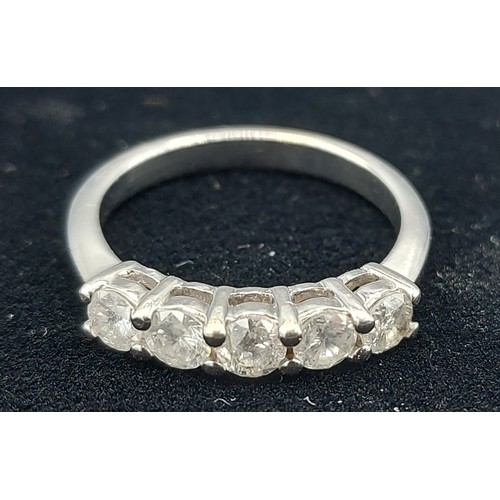 164 - An 18ct white gold five stone Diamond ring, 4.4gms, rind size O