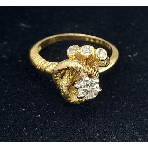 170 - An 18ct gold modern Diamond set ring of shaped form, 4.9gms, ring size M