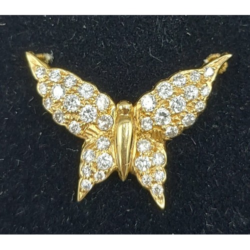 171 - An 18ct gold pendant in the form of a Butterfly set with Diamonds, 1.9gms