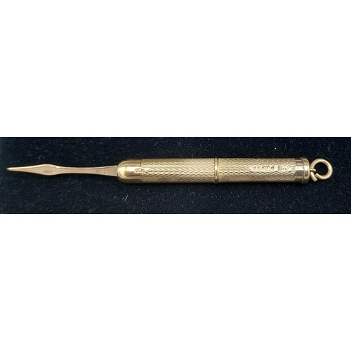 172 - A 9ct gold cased toothpick with suspension ring, 6.5gms