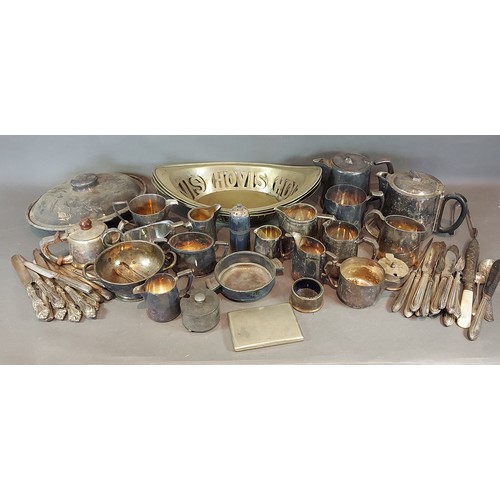 52 - A Large silver plated meat dish cover together with vaious metal wares and four pewter moulds