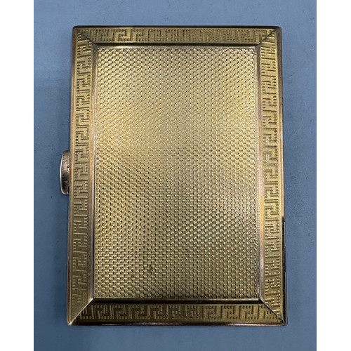 55 - A 9ct gold cigarette case with Greek Key pattern and Engine turned decoration, 88gms
