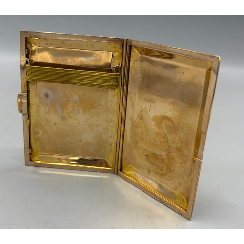 55 - A 9ct gold cigarette case with Greek Key pattern and Engine turned decoration, 88gms