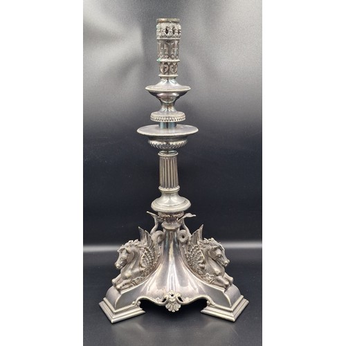 A 19th Century silver plated table centre candlestick decorated tri ...