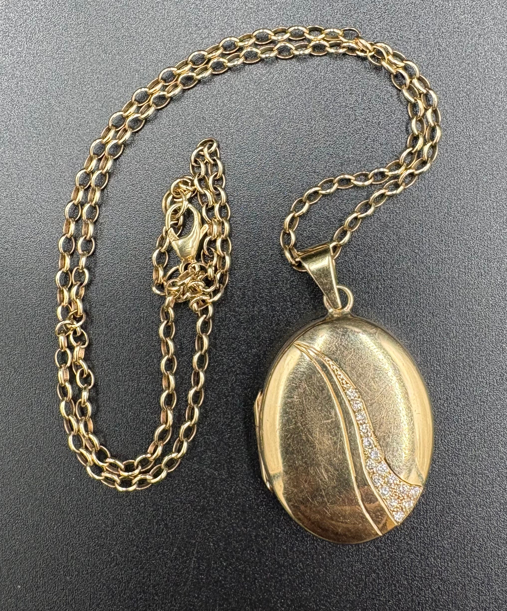 A 9ct gold locket set with two rows of Diamonds together with a 9ct ...