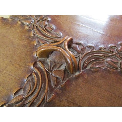 211 - Folding carved table - H: 58cm