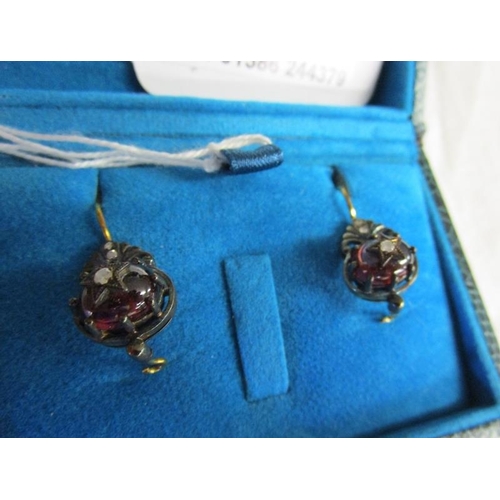 52 - Pair of cabochon garnet & diamond earrings