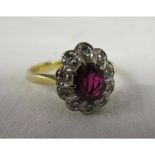 63 - 18ct ruby & diamond cluster ring