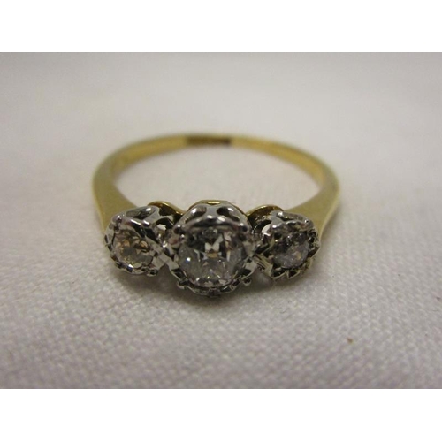 76 - 18ct gold & platinum 3 stone diamond ring