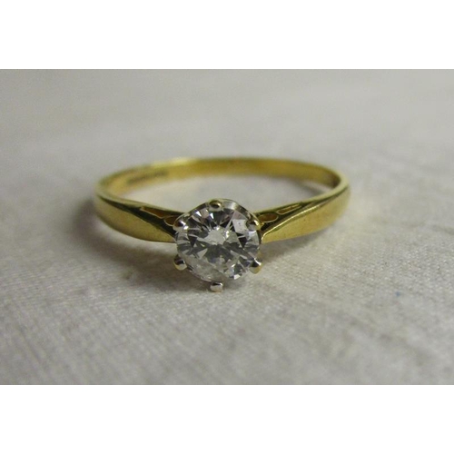 82 - 18ct gold diamond solitaire ring