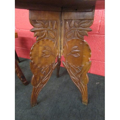 211 - Folding carved table - H: 58cm