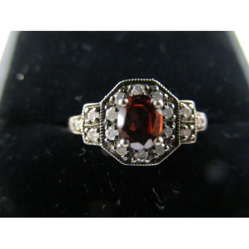 70 - 15ct gold garnet & diamond ring