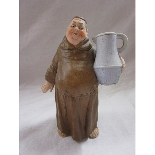 175 - Collection of monk figures and monk themed jug