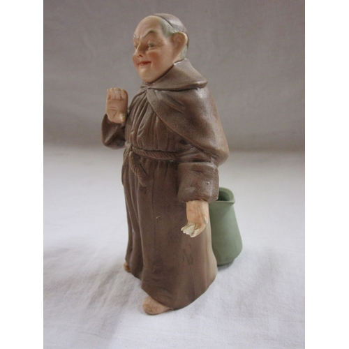 175 - Collection of monk figures and monk themed jug