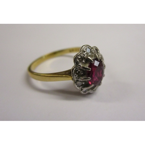 63 - 18ct ruby & diamond cluster ring