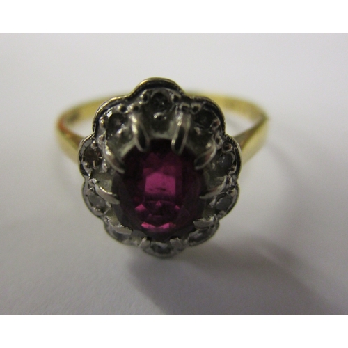 63 - 18ct ruby & diamond cluster ring