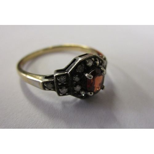 70 - 15ct gold garnet & diamond ring