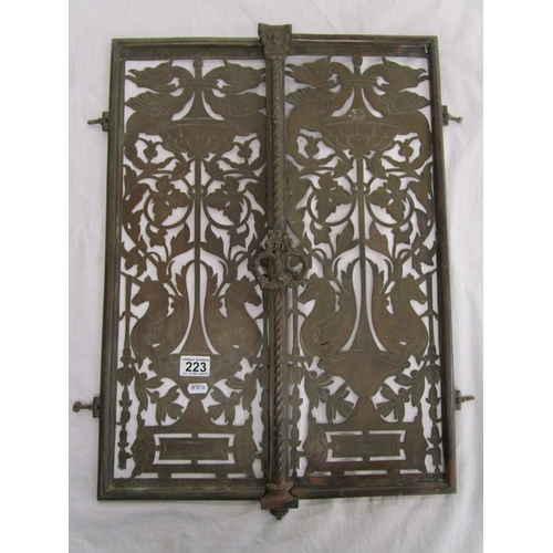 223 - Pair of early brass pierced grill doors