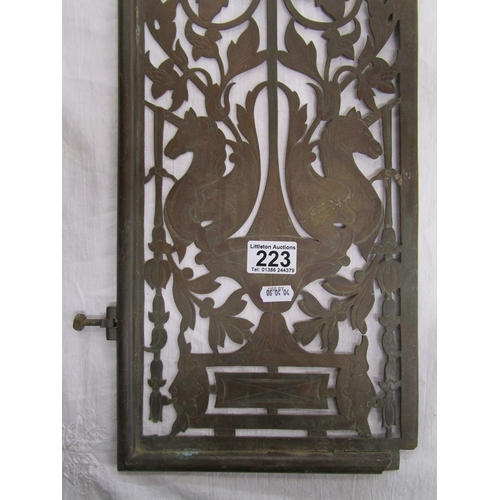 223 - Pair of early brass pierced grill doors