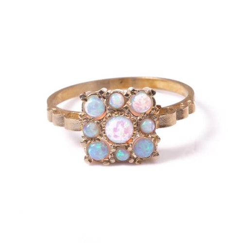 13 - 18ct silver-gilt opal (0.60ct) ring